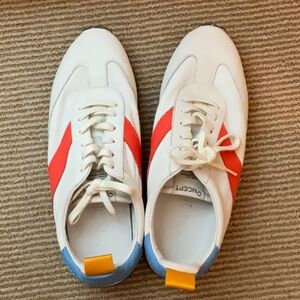 White, red, blue, and yellow Sneakers with Classic Athletic Style